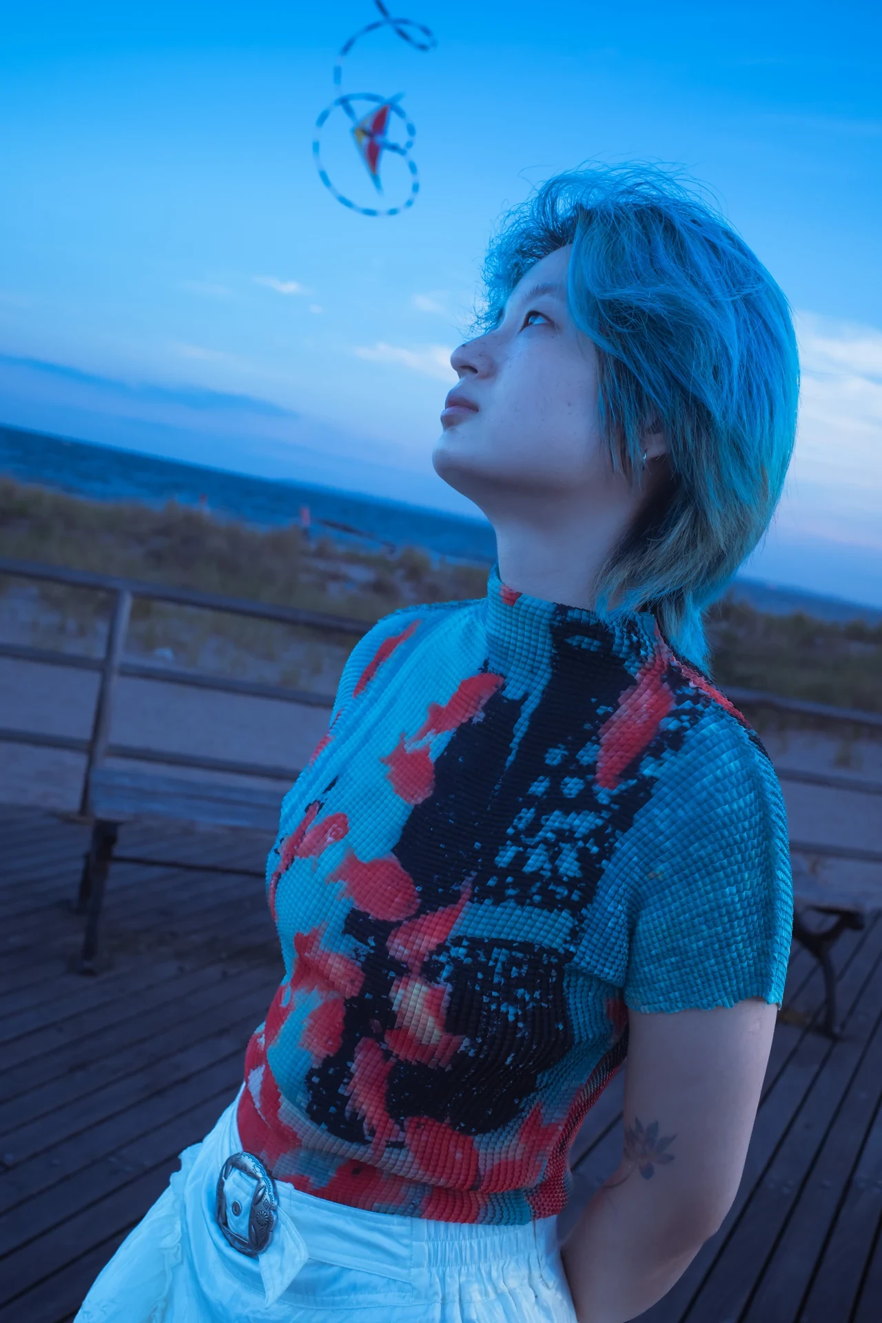 Violet — You See half-length portrait looking toward the sky at Coney Island